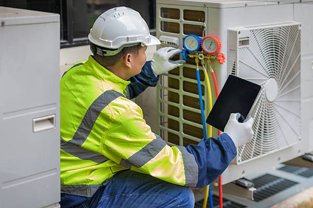 Professional Ductwork Repair technician working in Urbana, IL